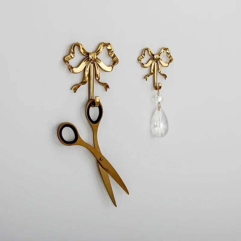 خطاف حائط فاخر على شكل قوس مصن - مراجعة Antique Brass Hook وسعره